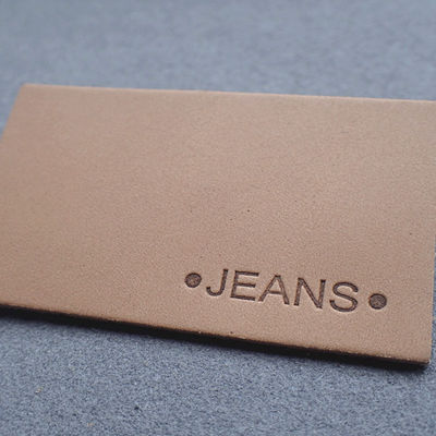 Het hete Stempelen sneed rechtstreeks In reliëf gemaakte Leerflarden voor Jeans